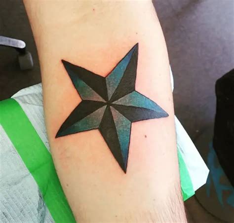 5 pointed star tattoo|Star Tattoo Meaning. 20+ Designs and Inspiration.